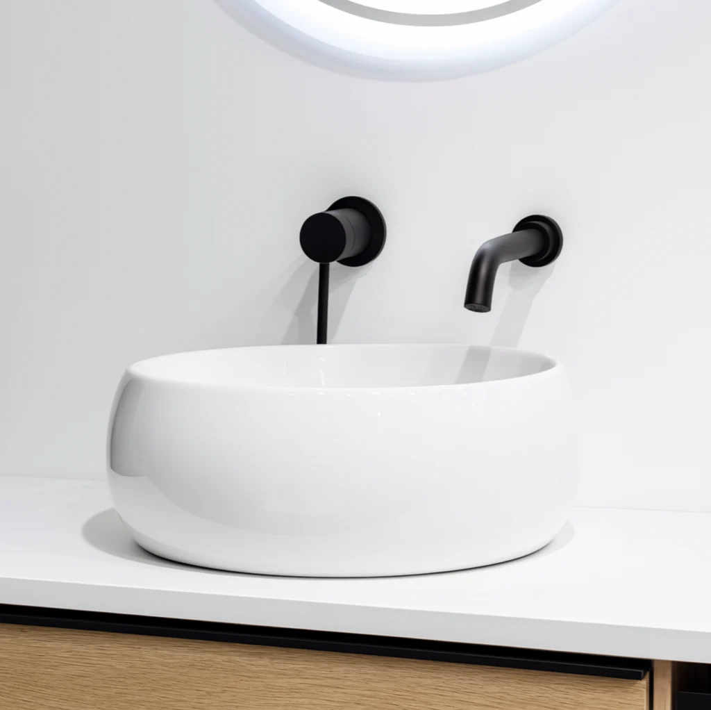 Lavabo sobre encimera circular en cerámica blanca